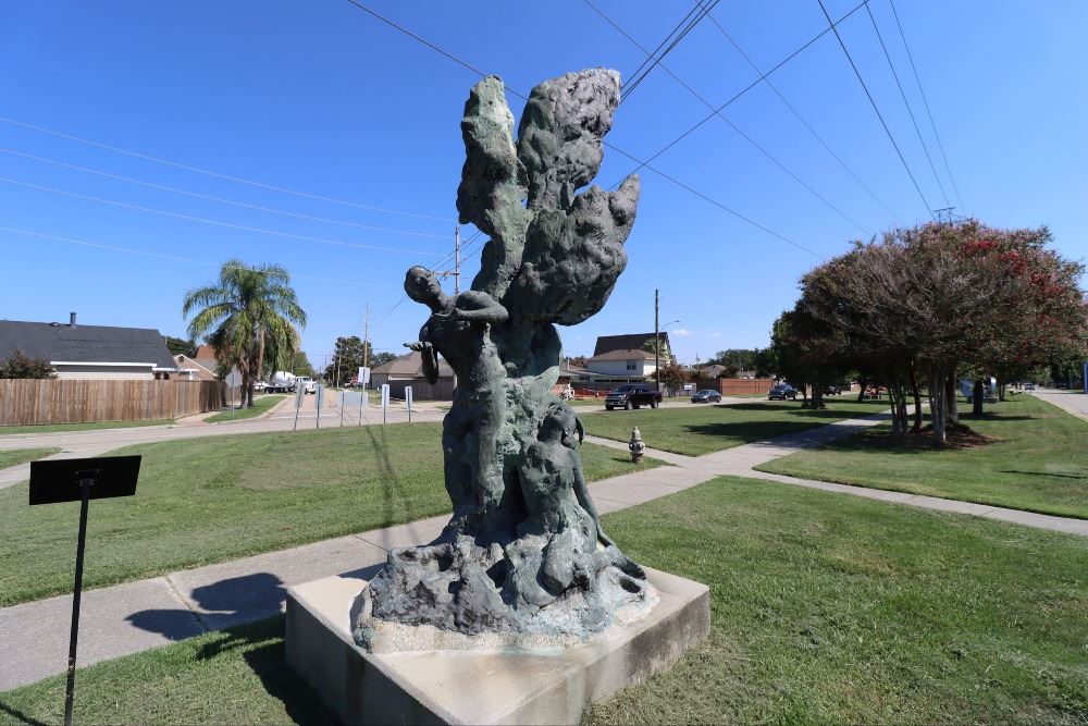 Man and Woman Under a Tree sculpture on Power Blvd. 